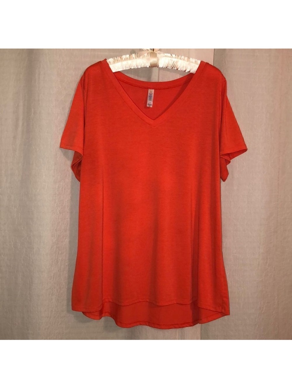 LuLaRoe 2X Christy short sleeve high low v-neck t shirt in vibrant orange